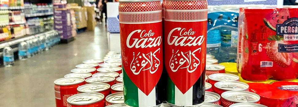 A vibrant display of Cola Gaza cans featuring their iconic red and green design, neatly arranged in a supermarket aisle, highlighting the beverage's cultural significance and availability in retail stores.