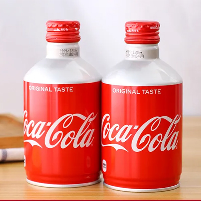 Two Coca-Cola aluminum bottles showcasing the iconic red and white design with 'Original Taste' branding.