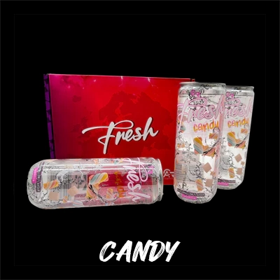 Fresh Candy drink cans with playful design, complemented by bold pink 'Fresh' packaging.