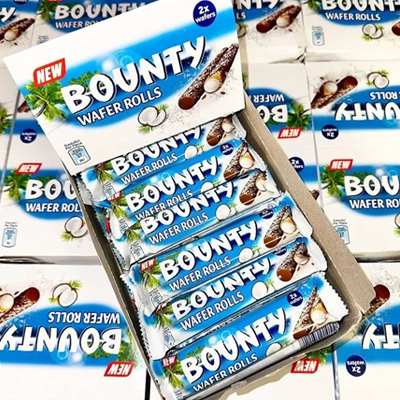 Box of Bounty Wafer Rolls featuring coconut and chocolate flavors, displayed in attractive packaging.