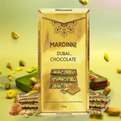 Mardinni Dubai chocolate bar with Antep pistachio and cream filling, featuring elegant golden packaging and rich chocolate layers.