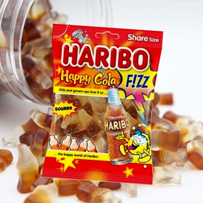 Haribo Happy Cola Fizz candy pack featuring fizzy cola bottle-shaped gummies in a shareable size.
