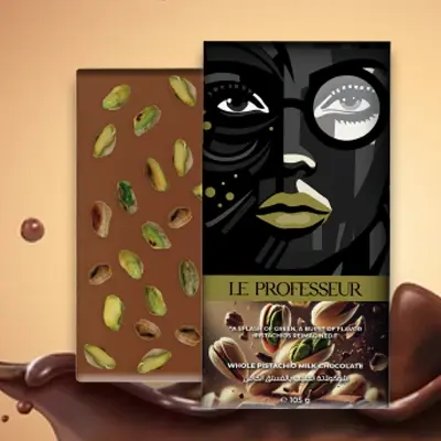 Le Professeur whole pistachio milk chocolate bar with artistic packaging and rich, nutty flavor.