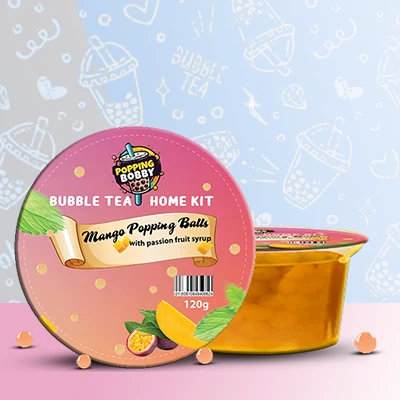 Popping Bobby Bubble Tea Home Kit with Mango Popping Balls and Passion Fruit Syrup for a tropical DIY bubble tea experience.