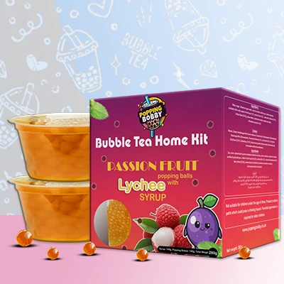 Popping Bobby Bubble Tea Home Kit with Passion Fruit Popping Balls and Strawberry Tea Syrup for a flavorful DIY bubble tea treat.