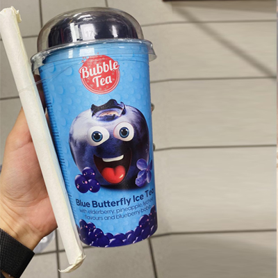 Bubble Tea Blue Butterfly Ice Tea with elderberry, pineapple, and blueberry flavors in vibrant packaging.