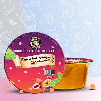 Popping Bobby Bubble Tea Home Kit with Passion Fruit Popping Balls and Lychee Syrup for a refreshing DIY bubble tea experience.