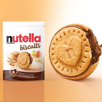 Nutella Biscuits packaging alongside a close-up of a biscuit filled with creamy Nutella